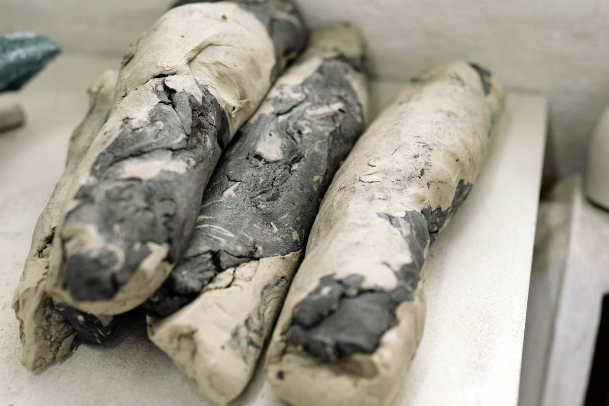 Pile of raw natural clay used as ceramic raw material